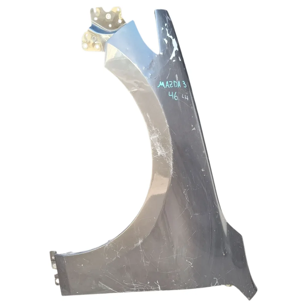 TAPABARRO IZQUIERDO MAZDA 3 4G 2020-2026 DETALLE